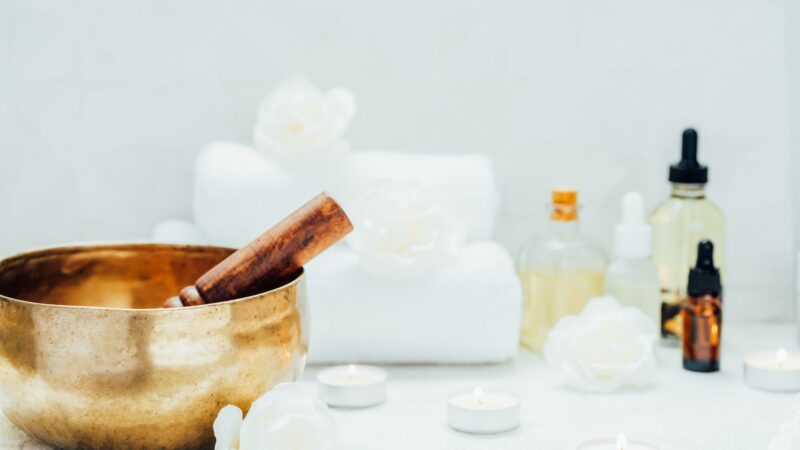 Spa and wellness massage kit with Tibetan singing bowl. Asian relaxing spa procedure